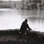 Pêcheur sur le Rhône, au niveau du débarcadère d'Onex