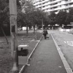 Personne tirant un caddie, Onex